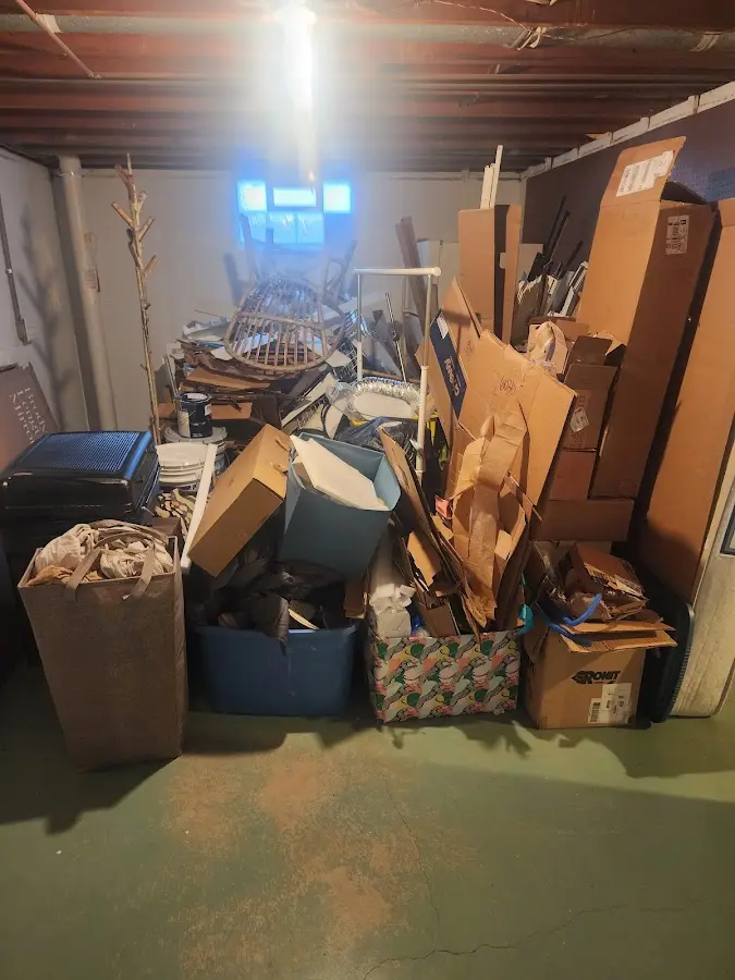 Roll-off dumpster container at job site for 2 Yard Dumpster Rental in Walpole